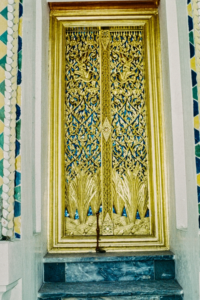 green and yellow tiles, gold door, Phra Gandhararat Tower, Grand Palace